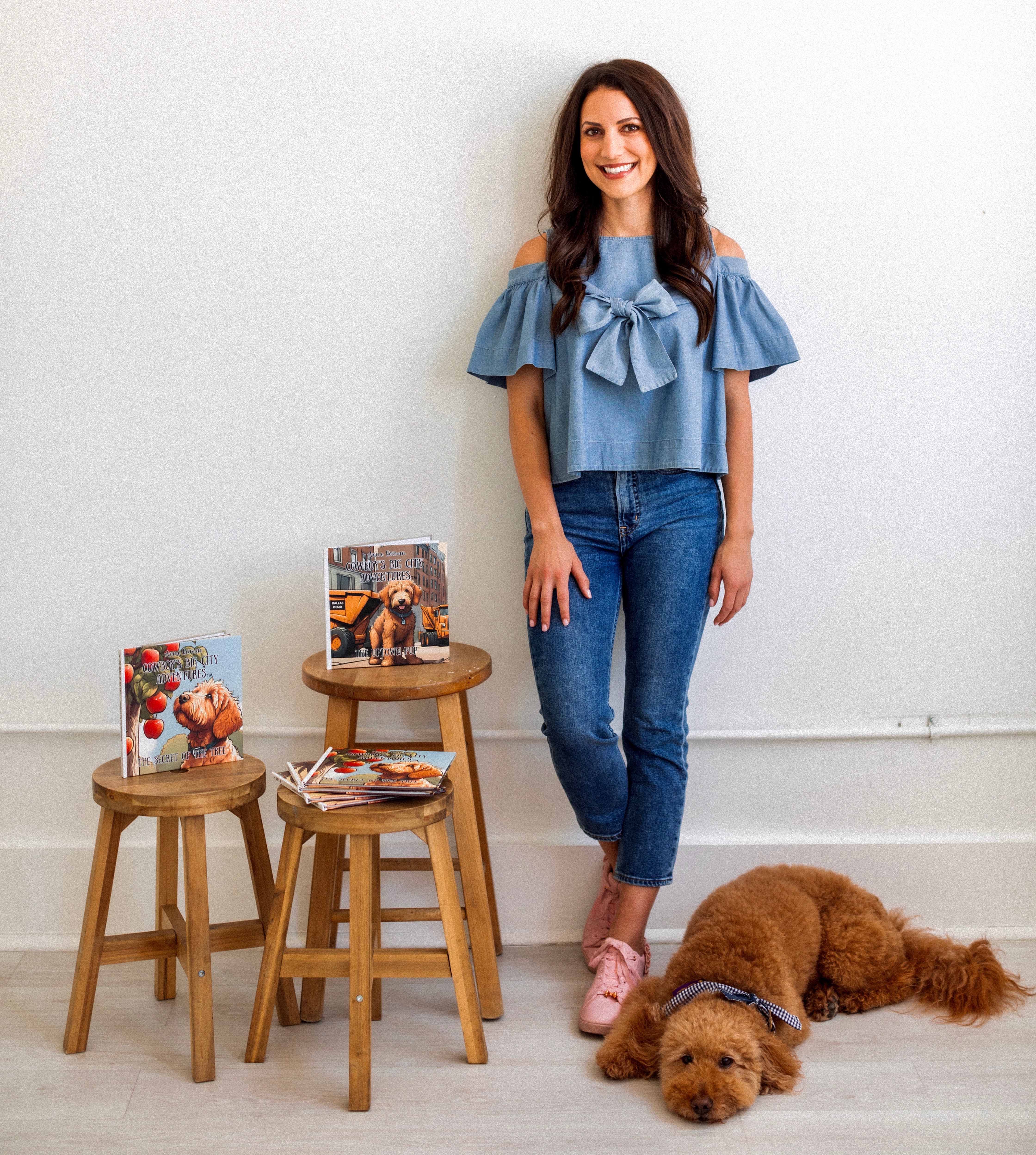Anna Reiman with her published series of children's books