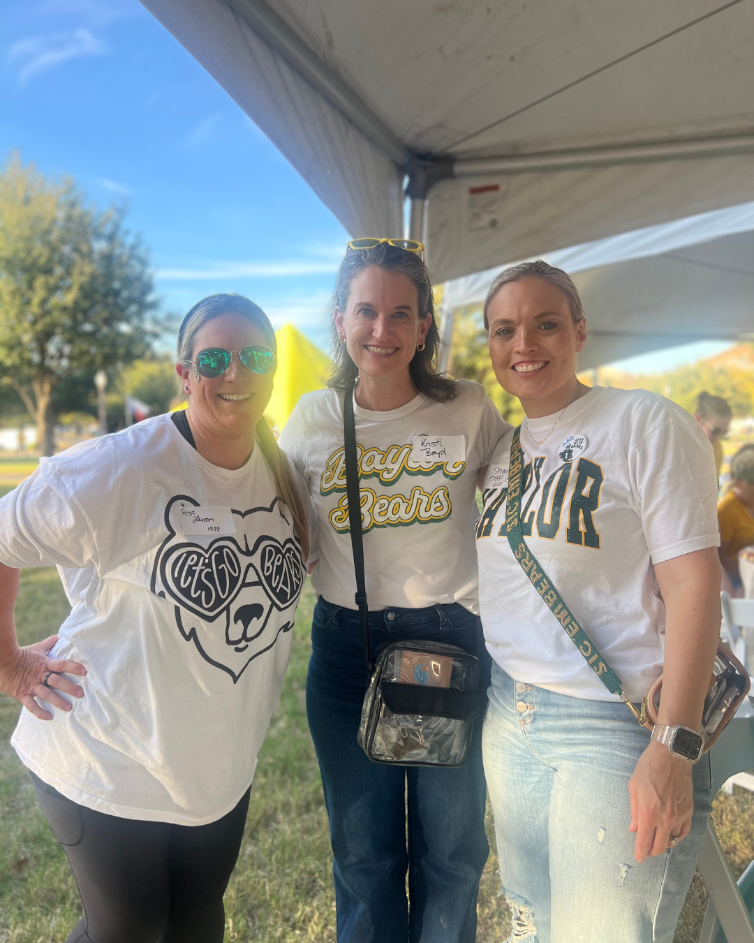 Shannon Seale poses with group in Baylor shirts 