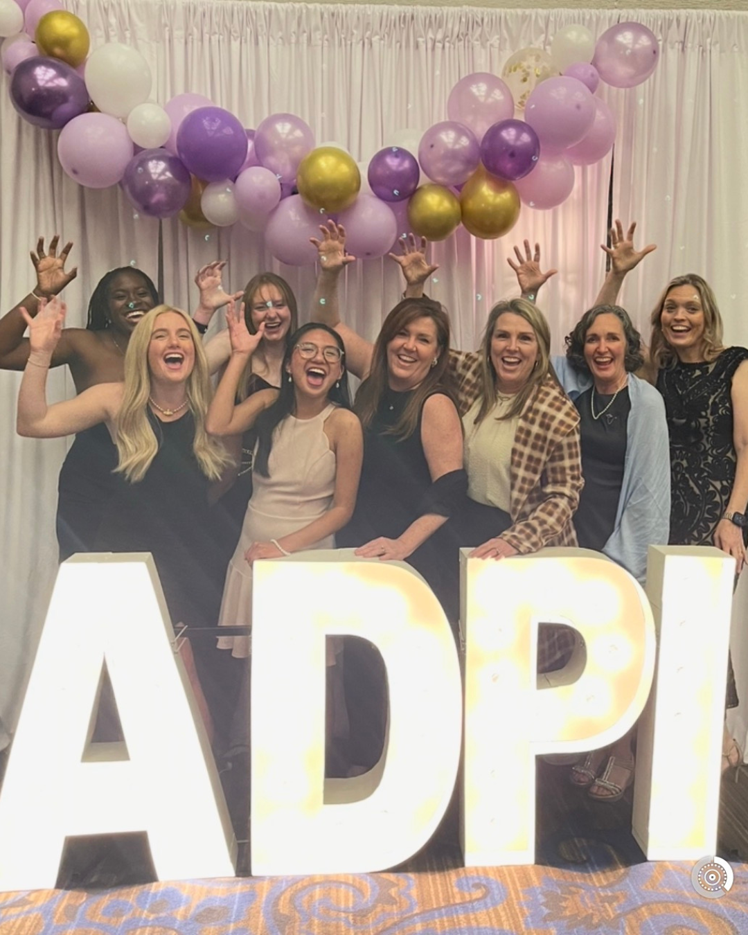 Shanoon Seale poses with a group of women at an ADPI reunion 