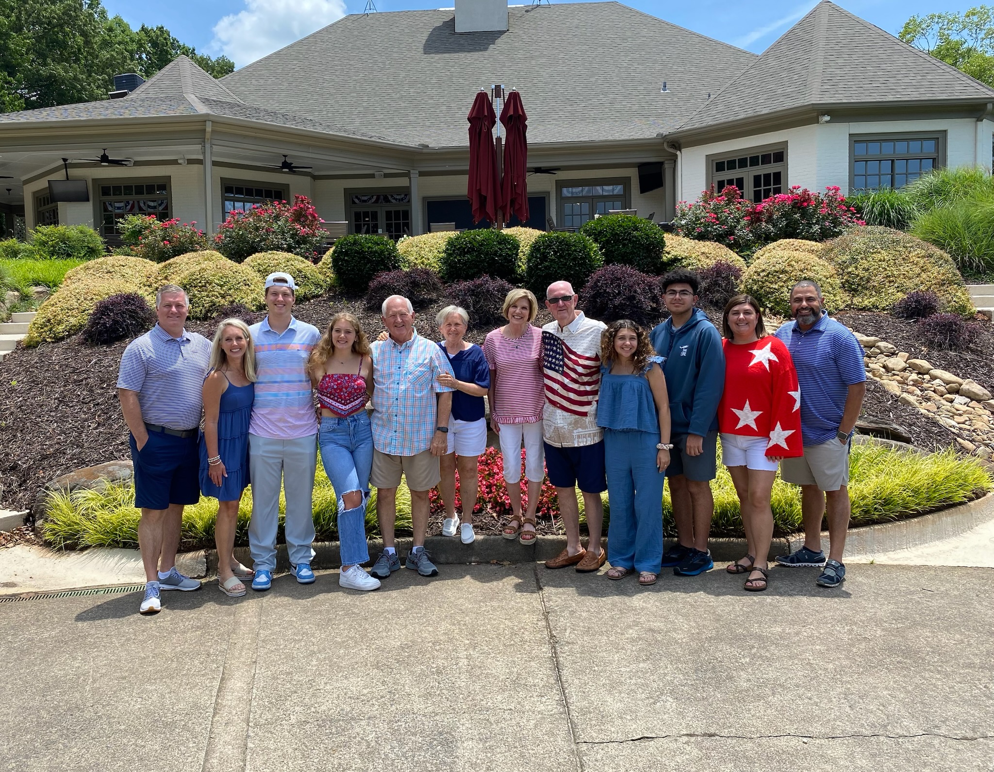 Luft, Dean, Hosni and Christian families pose together on the 4th of July