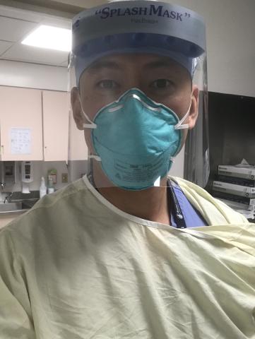 Sam Han in scrubs